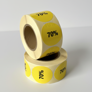 Gul rabatklistermærke 70%. Rulle med 500 stk. Ø 30 mm.