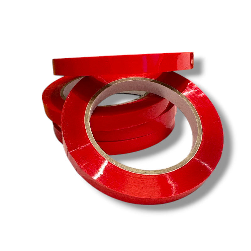 Poselukkermaskines tape i rød, 12 ruller. Pris vist pr. stk.