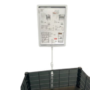 SuperSellerS A4 grey plastic sign holder with spring mount attached to a wire basket for retail display