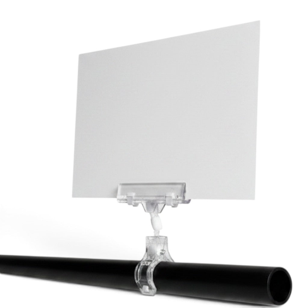 SuperSellerS clear acrylic sign holder with wide clamp holding a blank white card on a black display rail